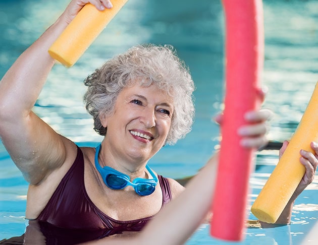 woman doing water areobics